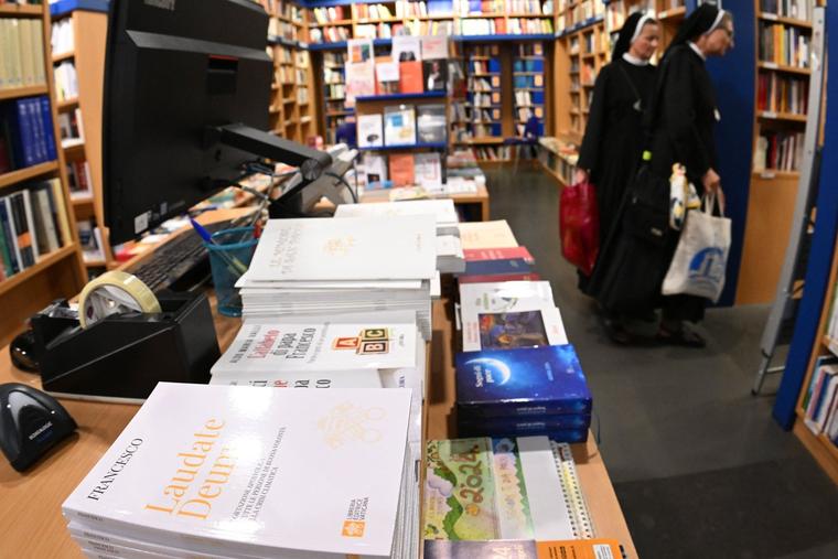 The environmental exhortation by Pope Francis is seen in a bookshop the day of its release, Oct. 4, near the Vatican.